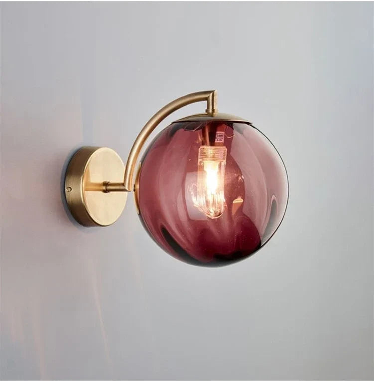 Brass and Tinted Glass Ball Sconce