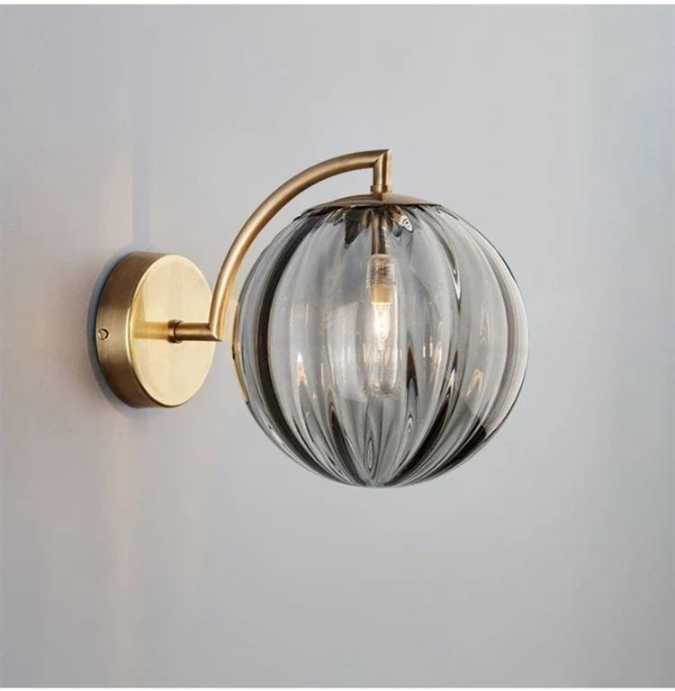Brass and Tinted Glass Ball Sconce