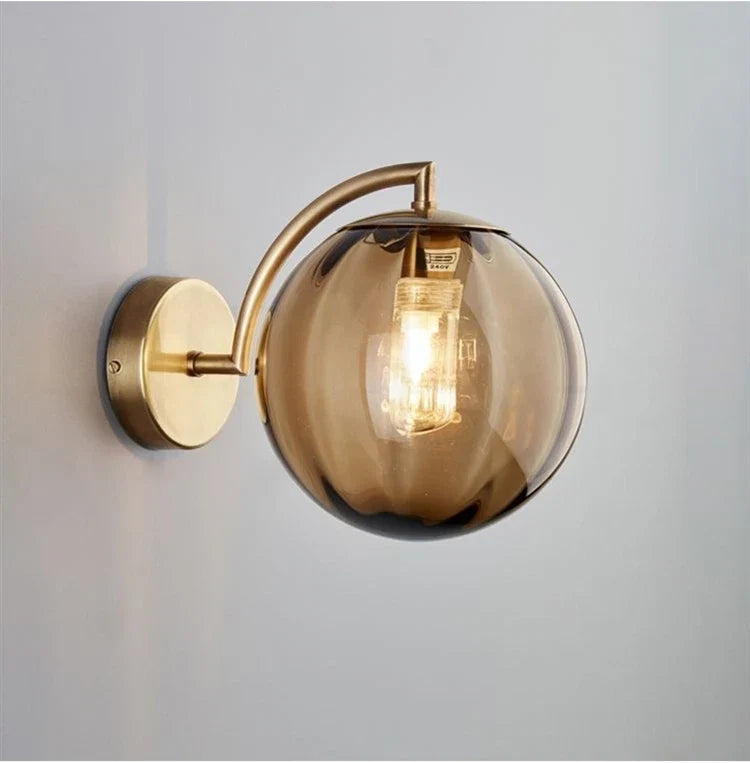 Brass and Tinted Glass Ball Sconce