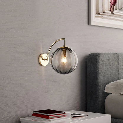 Brass and Tinted Glass Ball Sconce