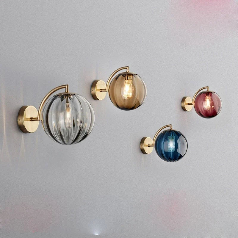 Brass and Tinted Glass Ball Sconce